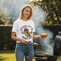 Load image into Gallery viewer, Trend Tee Club white 100% cotton unisex tee with a retro hotdog character wearing a patriotic hat, holding spatulas. "Suns Out Buns Out" graphic.